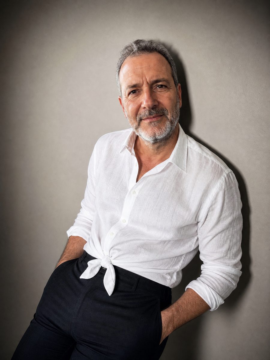Founder photo for a white-and-gray site